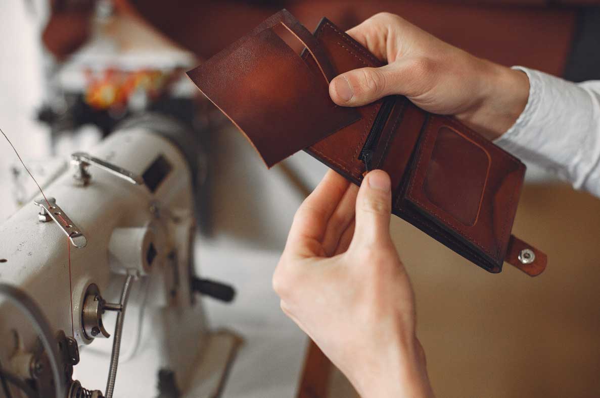 origen carteras de hombre